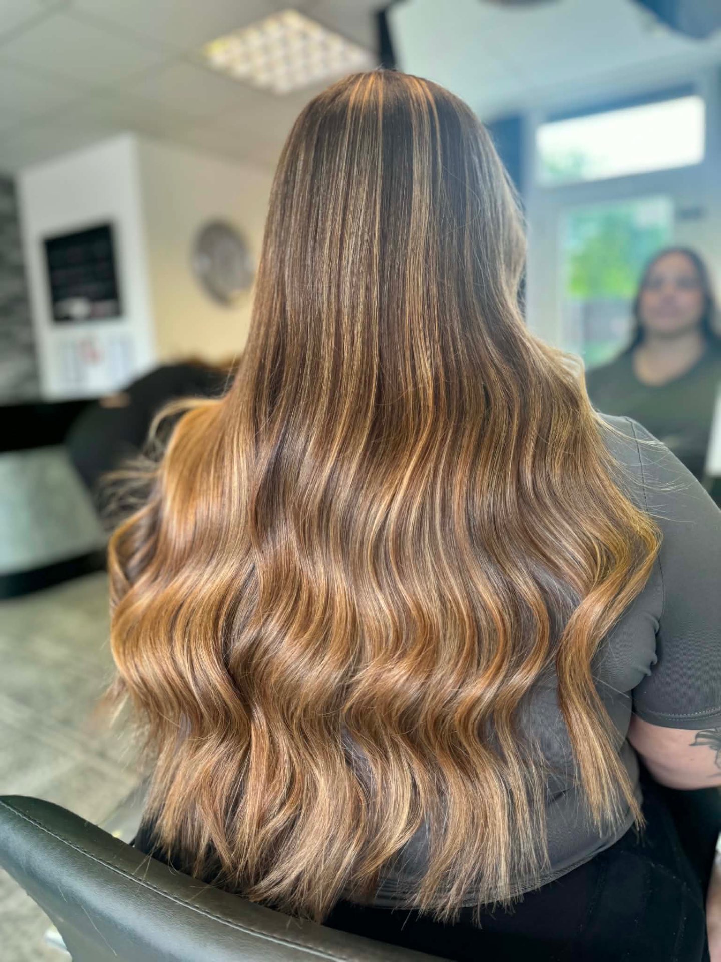 Long caramel balayage with bouncy big waves